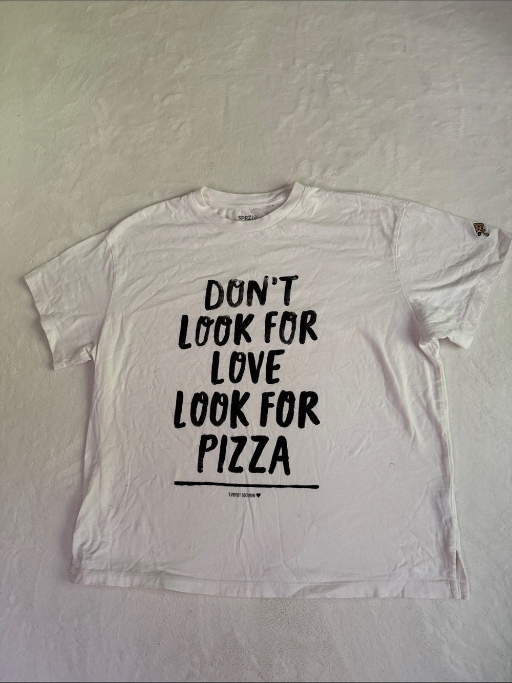 Uniqlo White Graphic Tee "Don't Look for Love Look for Pizza" Timothy Goodman